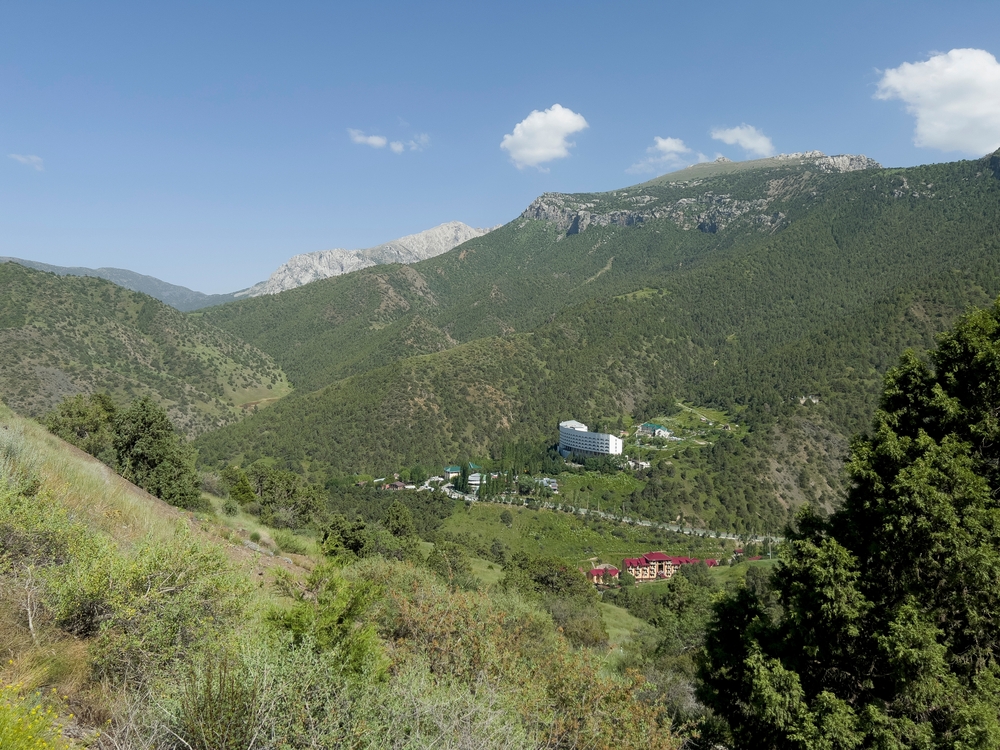 Mountains of Zaamin national park with resort at the bottom of the valley