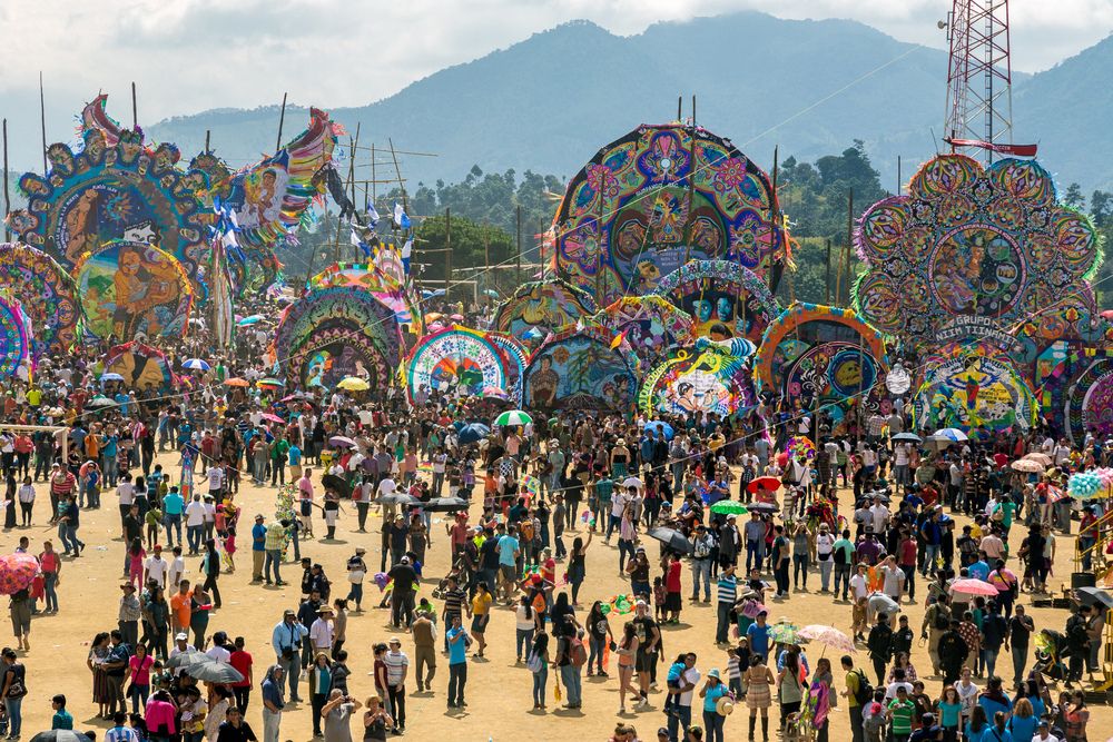 Many people and kites at the All Saints Day Kite Festival