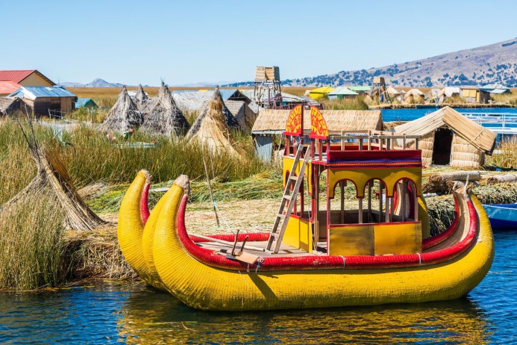 16 Fun Facts About Peru's History, Geography and Culture 5 Floating Grass on the Uros islands with a yellow boat